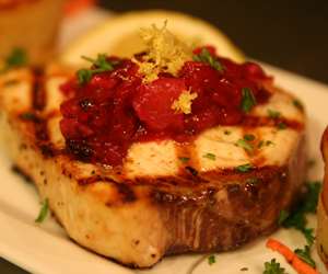 Grilled swordfish with a holiday chutney